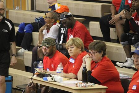 GBSA volunteers staff the scorekeepers table during a tournament