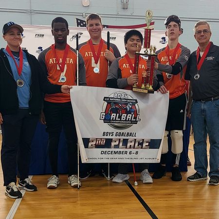 The Atlanta boys goalball team poses with their 2024 2nd place trophy
