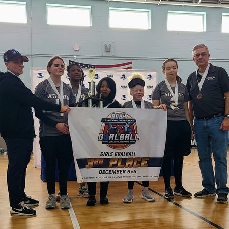 The Atlanta girls goalball team poses with their 2024 3rd place trophy